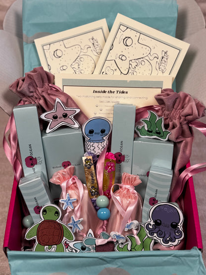 Hawaii makeup brand gift set box with stickers inside a box with velvet pink pouches.